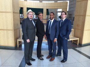 Bales standing next to his mock trial teammates