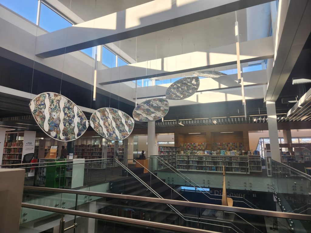 3-d art suspended over library space