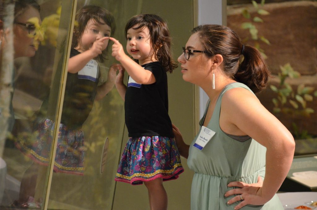 Sasha and Edith Raab participate in a Dean's Fellows event at the KU Natural History Museum