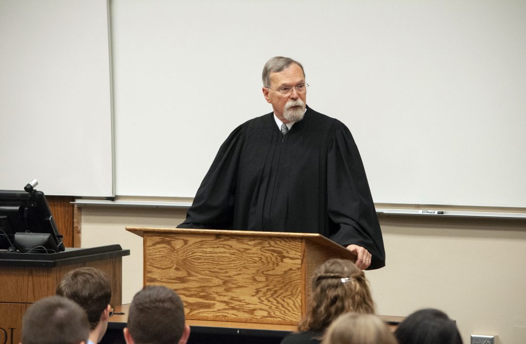 Kansas Supreme Court Chief Justice Lawton Nuss speaks to first-year law students