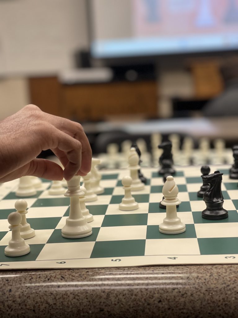 close up of chess board mid-game
