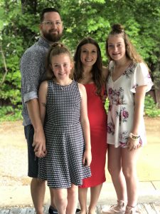 Caroline Kastor with her husband Bobby and stepdaughters