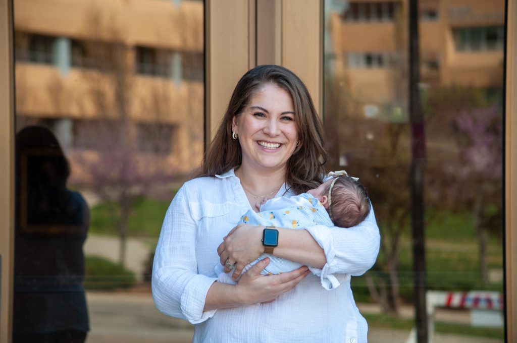Olivia Almirudis Schneider, 3L, and her daughter.