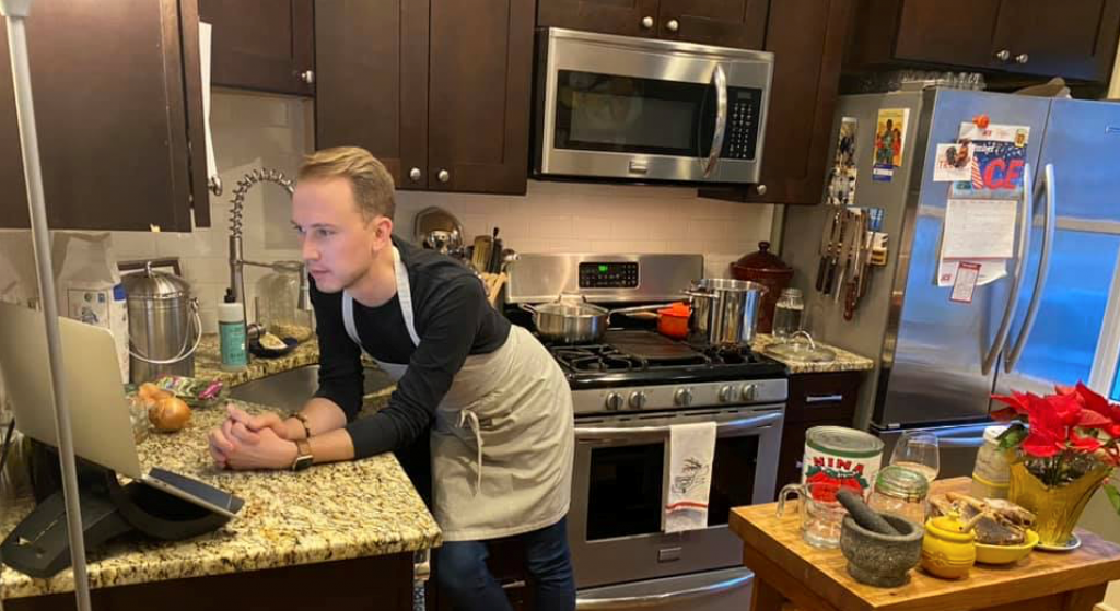 Doug conducts a cooking class/virtual dinner party via Zoom in his kitchen