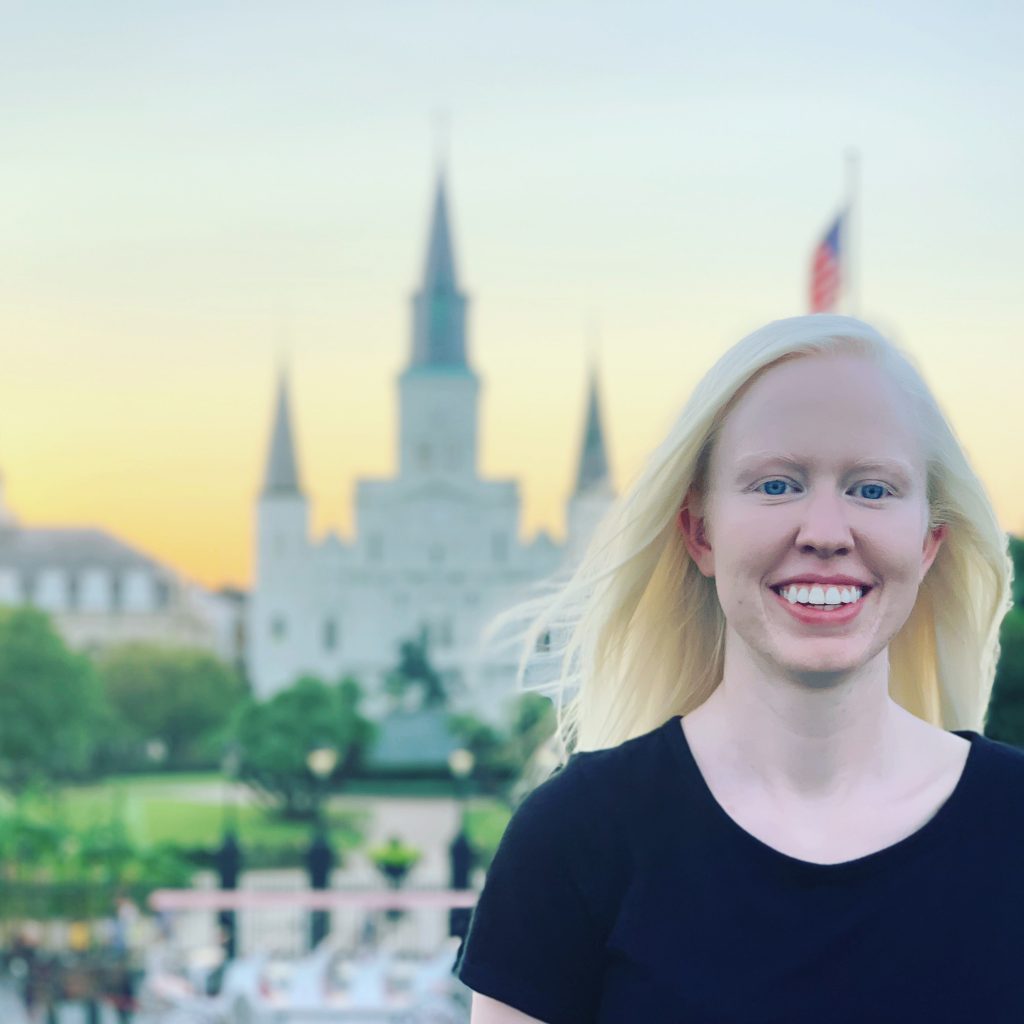 Liz Thompson with Jackson Square in New Orleans in the background