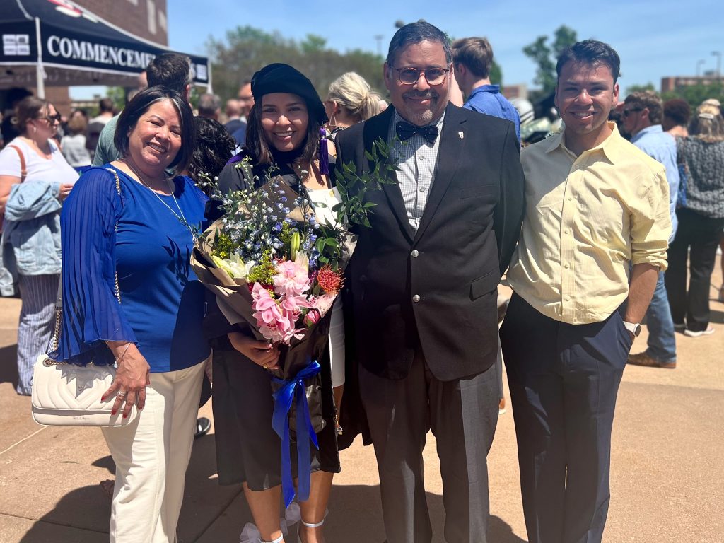 Lopez and family after the 2023 Hooding Ceremony