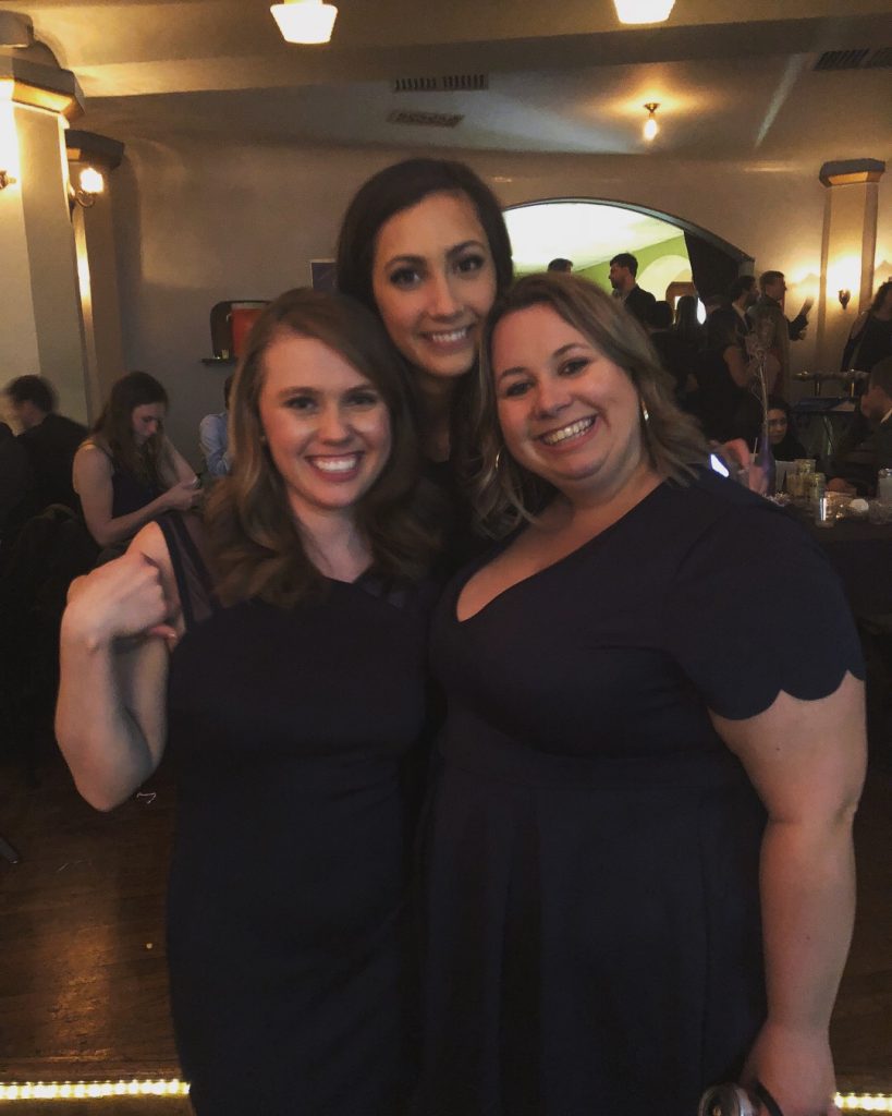 KU Law students Jessie Pringle, Erica Ash and Claire Kebodeaux attend the 2018 Pub Night event.