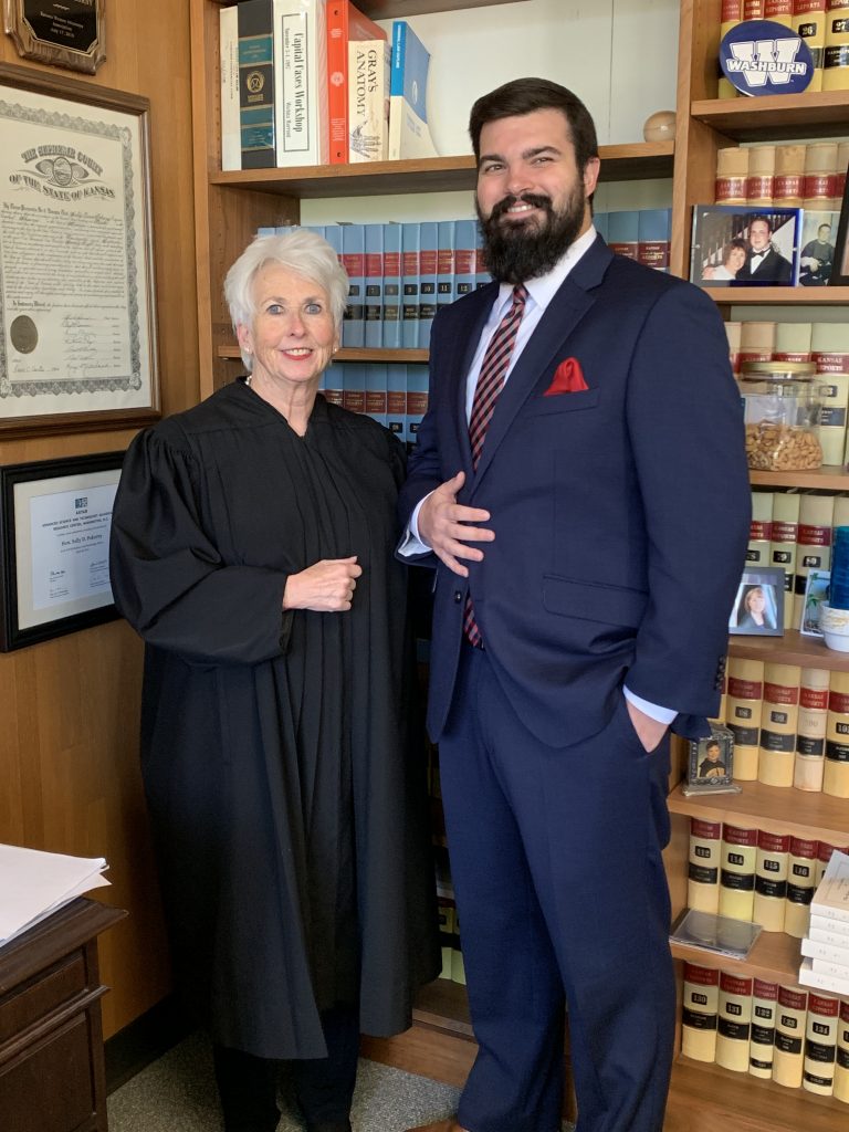 Judge Sally Pokorny standing next to Jackson Ely
