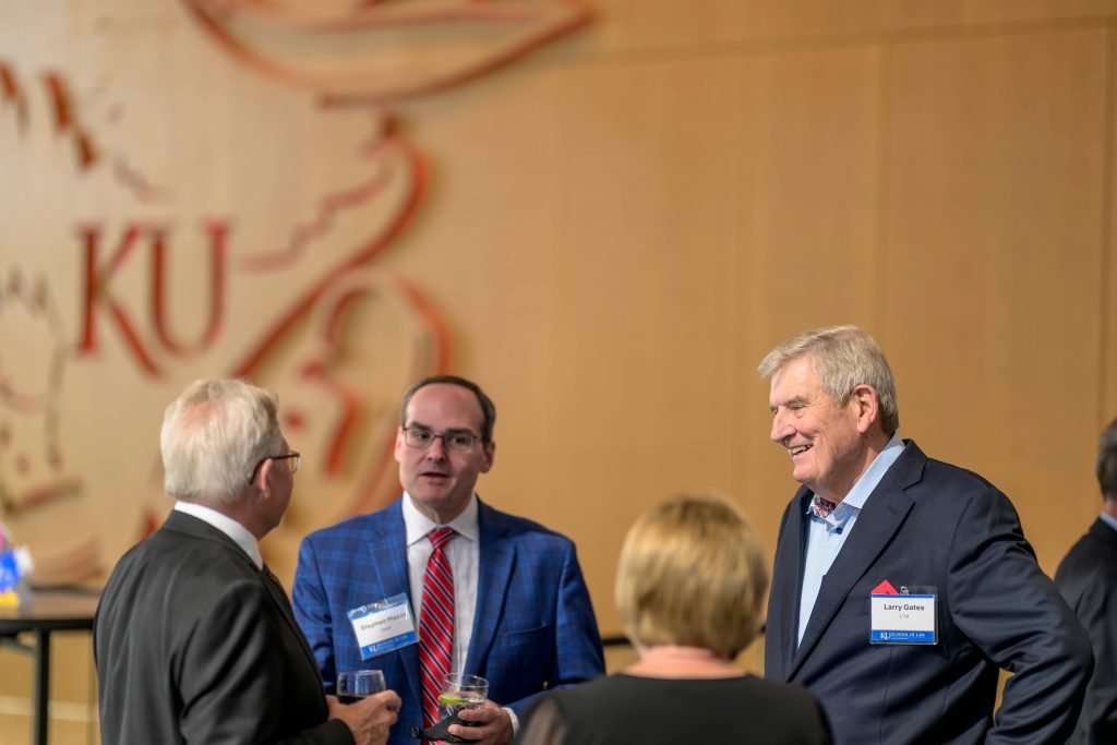 Dean Mazza speaks with KU Law alumni during the 2024 50/50+ Reunion.