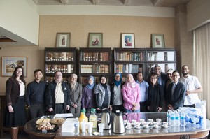 Zainab Radhi with family and friends following successful defense of her dissertation.