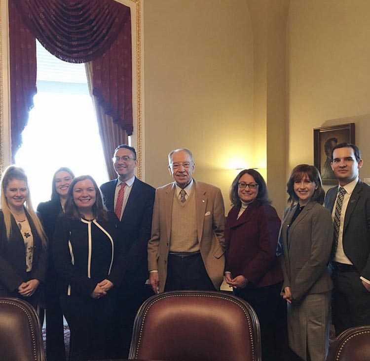 Iowa Senator Chuck Grassley with KU Law Professor Jennifer Schmidt and 6th Semester students.