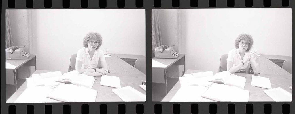 Two black and white images of Ellen Sward at a desk with papers