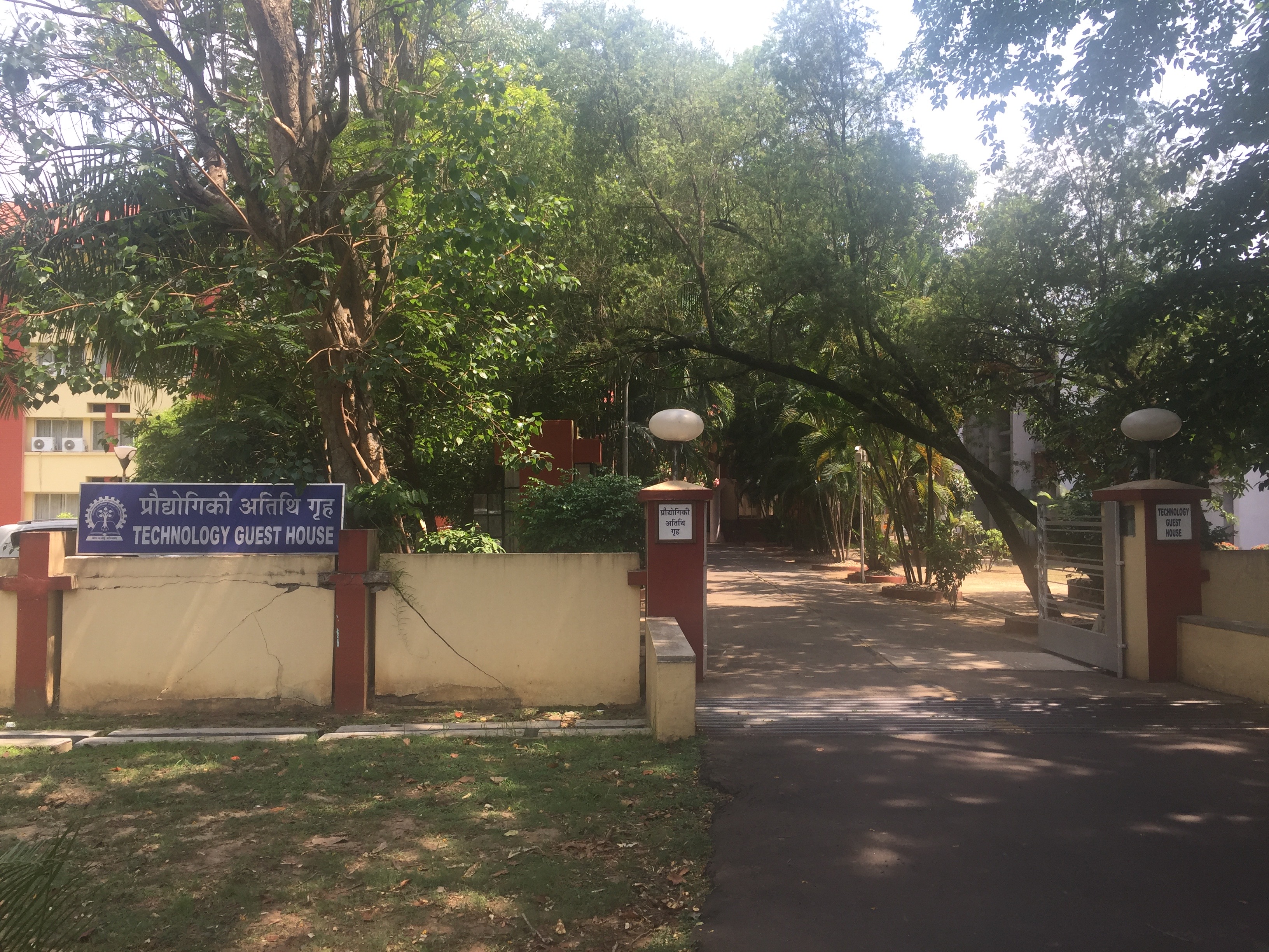 the driveway and wall surrounding the Technology Guest House