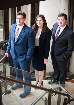 Ben Stringer, right, with TYLA National Trial Competition regional champion teammates Joe Uhlman, left, and Jordan Kane.