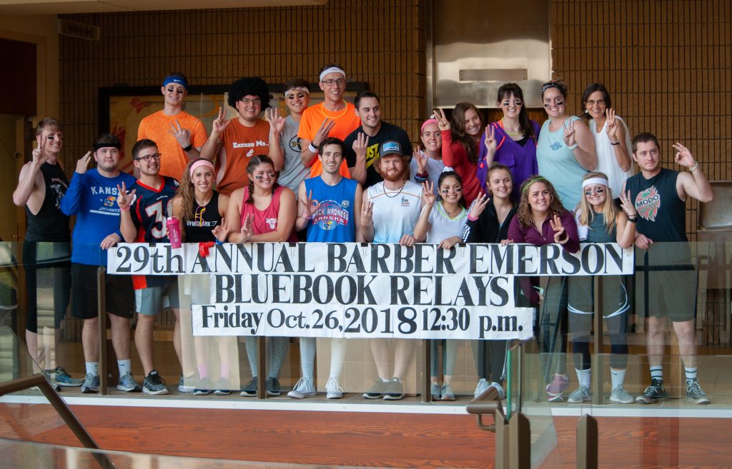 a group of people dressed in running gear
