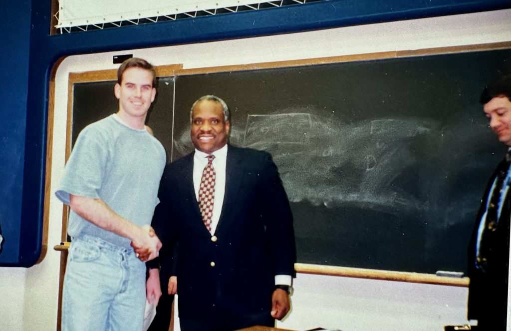 Roberts, Clarence Thomas (center) and Stephen Mcallister (right) during Thomas' KU Law visit.