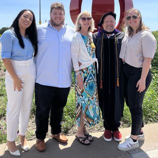 Hendler and his family after the Hooding Ceremony.