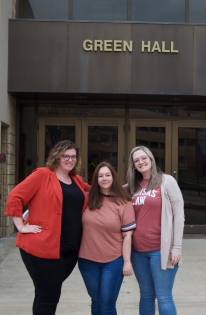 Heddy Pierce-Armstrong, Melinda Foshat and Samantha Lippard post in front of Green Hall
