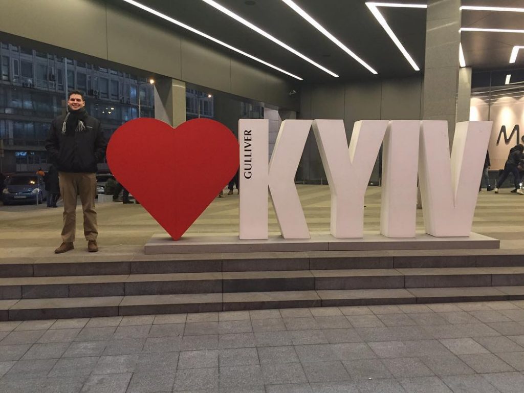 Josh DeMoss with 'I Heart Kyiv' sign.