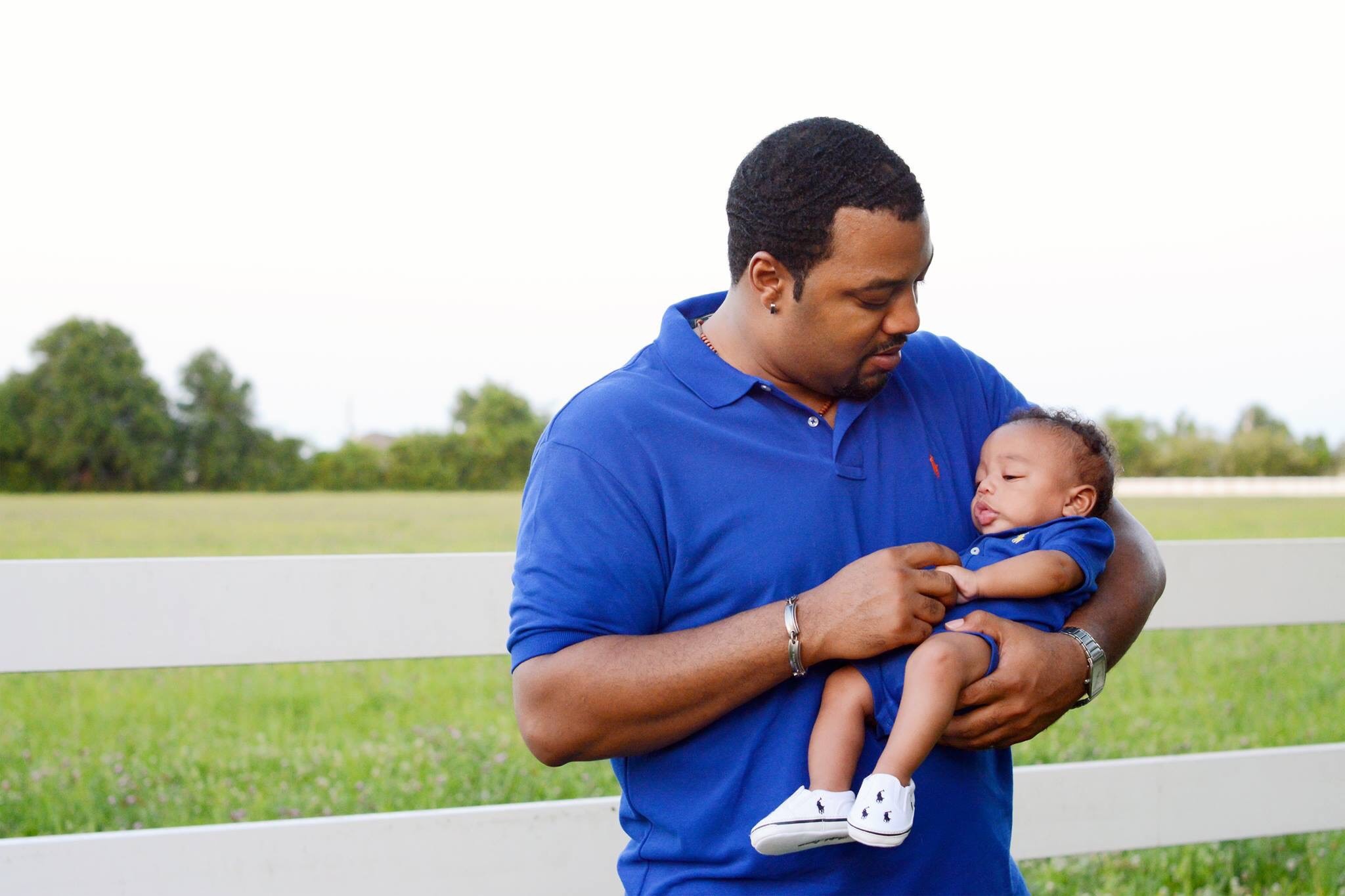 Kriston Guillot and his infant son, Kai.