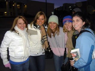 A group of women smiling together.