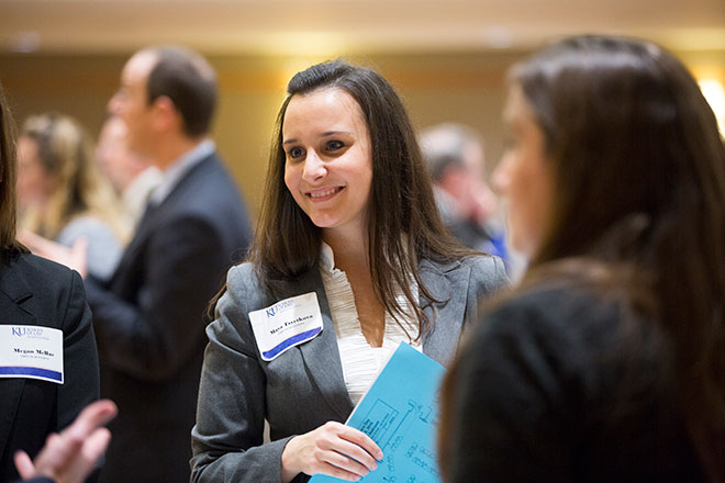 Maya Tsvetkova at an event wearing a name tag