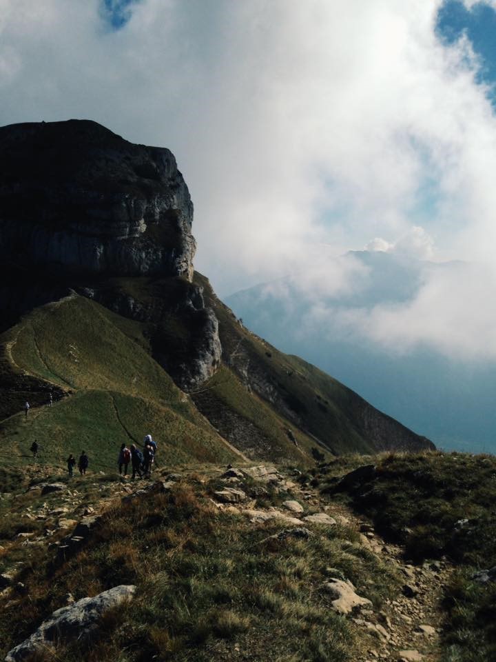 Mountainous terrain and clouds.