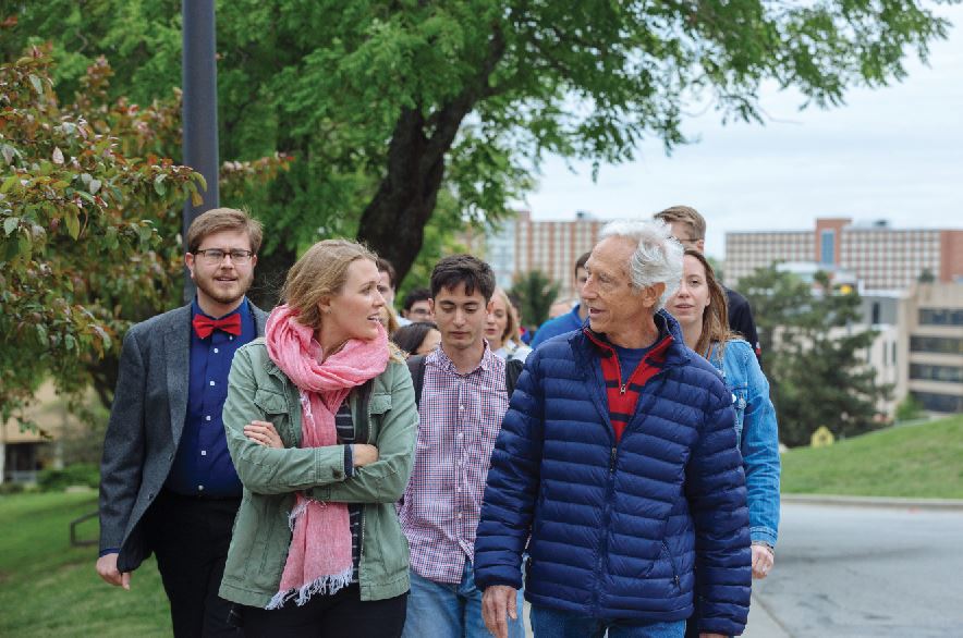 Webb Hecker leads the Walk to Old Green Hall, an annual pilgrimage to the law school's former home, and shares stories with students along the way