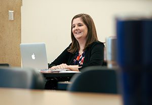 KU Law student Emily Brown in a KU Law classroom.