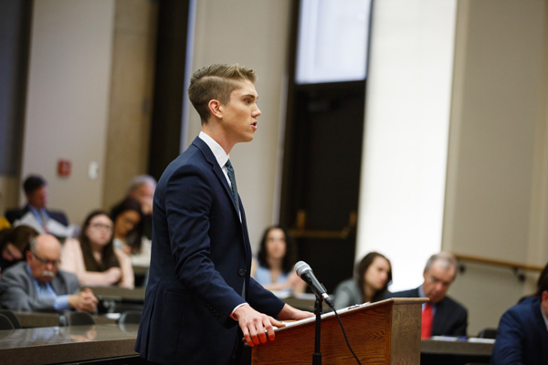 TJ Blake presents an argument in the KU Law courtroom