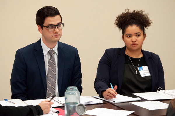 Brett Sitts participates in a Deposition Skills simulation course with Jasmin Townsend.