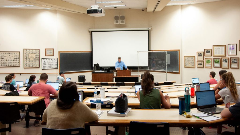 Bar preparation instructor Glenn Jewell reads instructions to students during a simulated bar exam.